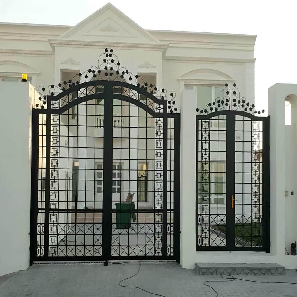 villa-door-wrought-iron-cs.jpg درب ورودی ساختمان لوکس در مشهد