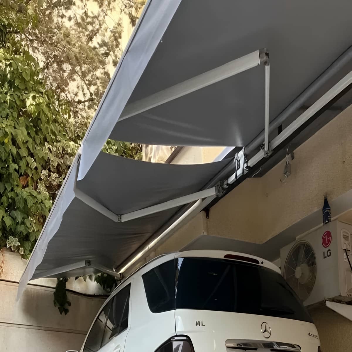 مکانیزم عملکرد سایبان برقی در مشهد با بازوی متحرک مکانیزم عملکرد سایبان برقی در مشهد با بازوی متحرک