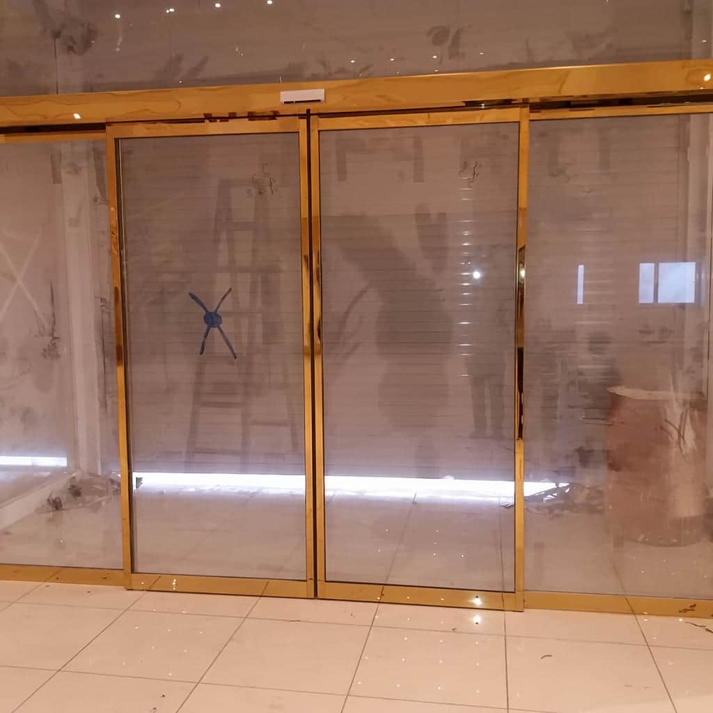 خرید درب شیشه ای اتوماتیک کشویی دو لت برای فروشگاه در مشهد خرید درب شیشه ای اتوماتیک کشویی دو لت برای فروشگاه در مشهد