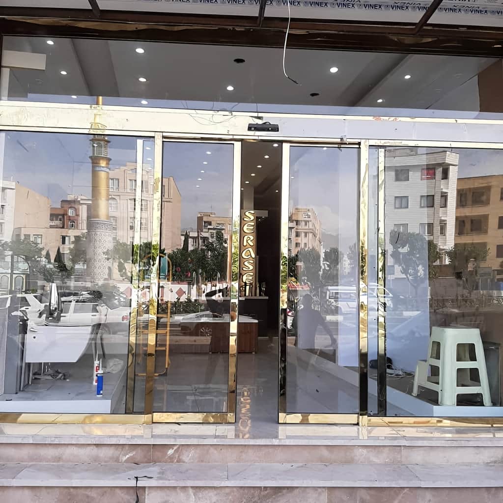 نصب درب اتوماتیک شیشه ای دو لنگه کشویی با اپراتور مناسب در مشهد نصب درب اتوماتیک شیشه ای دو لنگه کشویی با اپراتور مناسب در مشهد