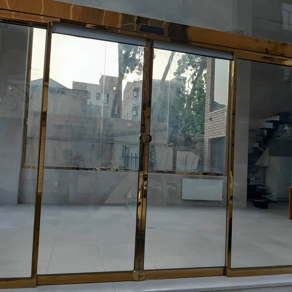 خرید درب اتوماتیک شیشه ای فریم دار آلومینیوم برای ورودی تجاری در مشهد خرید درب اتوماتیک شیشه ای فریم دار آلومینیوم برای ورودی تجاری در مشهد