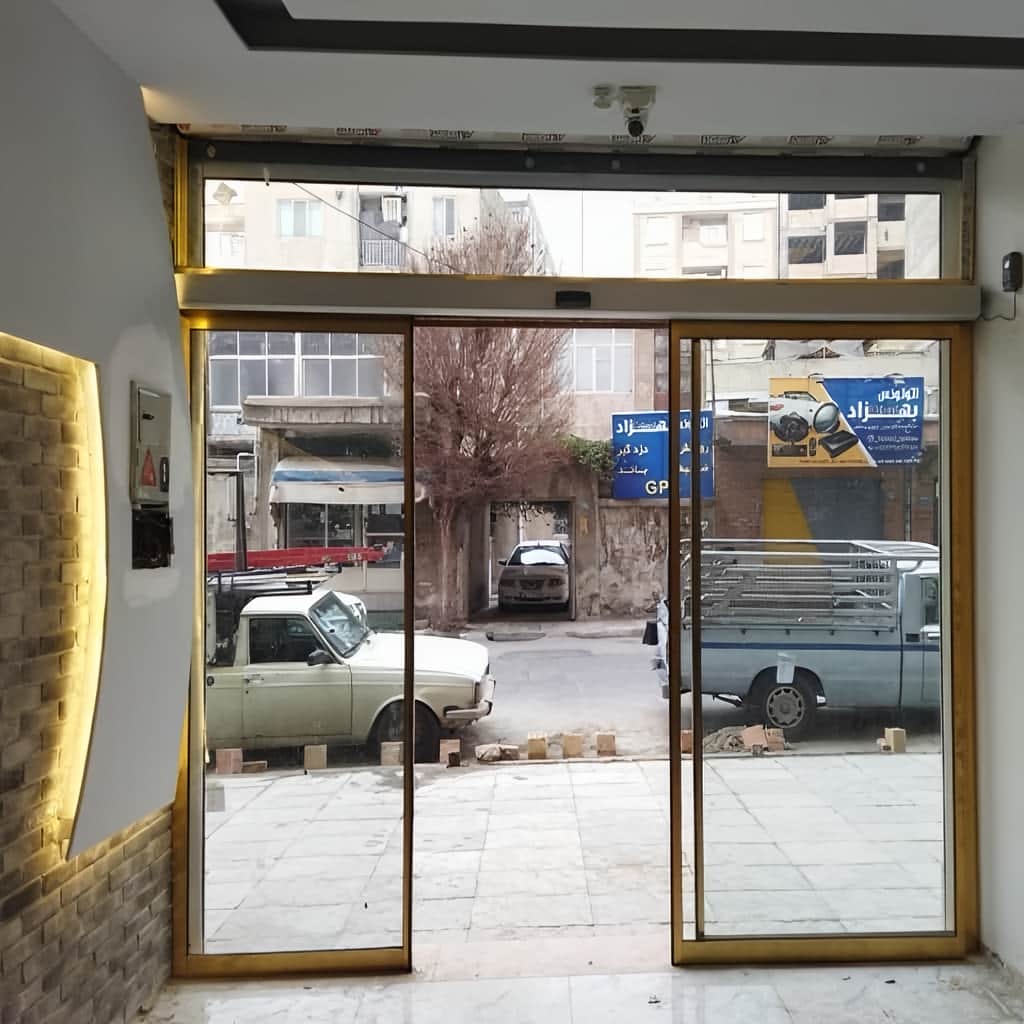 سفارش درب اتوماتیک شیشه ای دو لنگه کشویی با شیشه سکوریت در مشهد