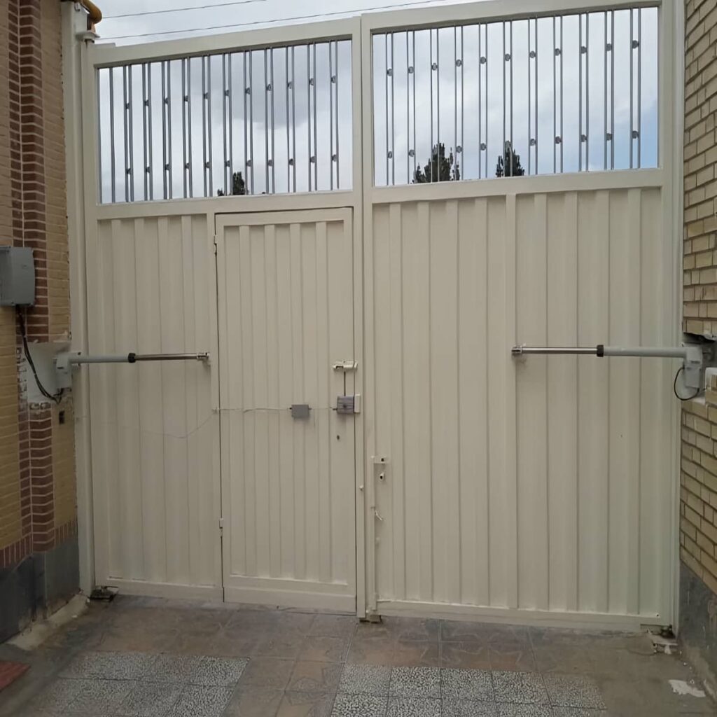 اجرای درب برقی ریلی پارکینگ با زیرسازی مناسب در مشهد
