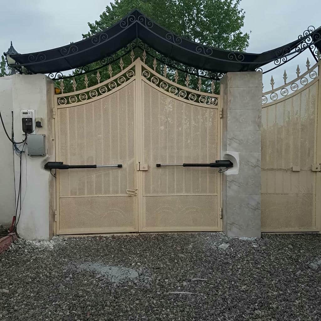 نصب جک درب پارکینگ سنگین کورس بلند با براکت مناسب در مشهد