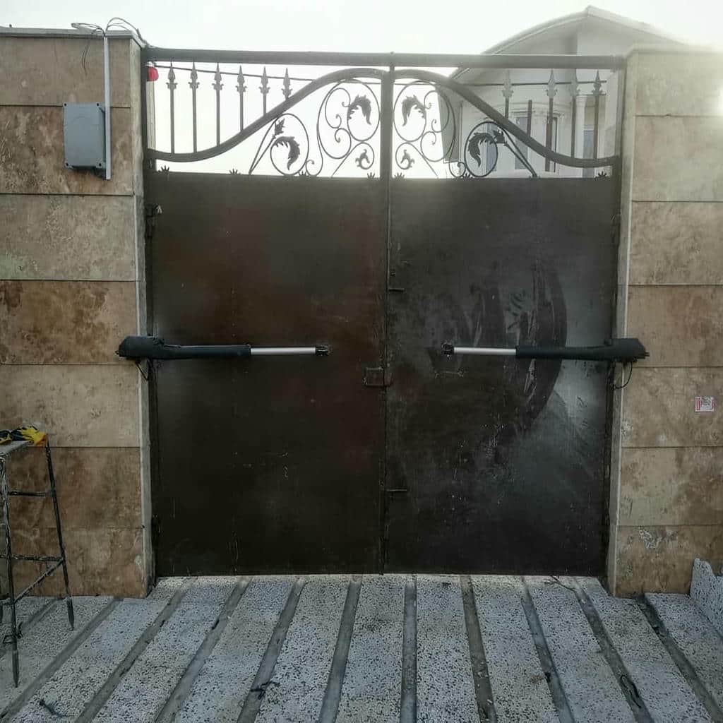 خرید درب اتوماتیک حیاط لولایی دو لنگه در مشهد